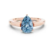 Fancy Blue Pear Cut Diamond Solitaire Ring Set in Rose gold with Prong Setting and Classic Band
