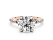 Round Cut Diamond Brilliant Solitaire Ring Set in Rose gold with Pavé Band and Prong Setting