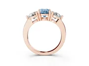 Fancy Blue Oval Cut Diamond Three-Stone Ring Set in Rose gold with Prong Setting and Classic Band