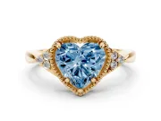 Fancy Blue Heart Cut Diamond Milgrain Solitaire Ring Set in Yellow gold with Tapered Pavé Band and Prong Setting