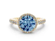 Fancy Blue Round Cut Diamond Halo Engagement Ring Set in Yellow gold with Pavé Band and Prong Setting