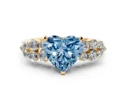 Fancy Blue Heart Cut Diamond Cluster Engagement Ring Set in Yellow gold with Pavé Band and Prong Setting