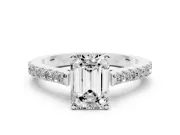 Emerald Cut Diamond Solitaire Engagement Ring Set in Silver with Delicate Pavé Band and Prong Setting