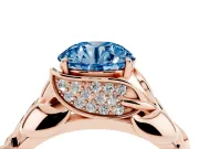 Fancy Blue Round Cut Diamond Leaf-Inspired Engagement Ring Set in Rose gold with Round Accents