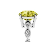 Fancy Yellow Round Cut Diamond Solitaire Ring Set in Platinum with Infinity Twist Pavé Band