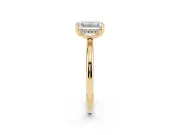Emerald Cut Diamond Solitaire Engagement Ring Set in Yellow gold with Prong Setting and Polished Band
