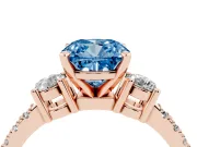 Fancy Blue Three-Stone Cushion Cut Diamond Pavé Band Ring Set in Rose gold with Prong Setting