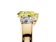 Fancy Yellow Three-Stone Pear Cut Diamond Ring Set in Yellow gold with Matching Prong Settings and Plain Band