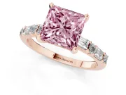 Fancy Pink Princess Cut Diamond Solitaire Set in Rose gold with Side Baguettes and Channel Set Band