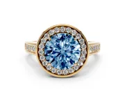 Fancy Blue Round Cut Diamond Halo Solitaire Ring Set in Yellow gold with Pavé Band and Bezel Setting
