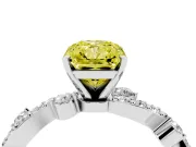 Fancy Yellow Radiant Cut Diamond Solitaire Twisted Band Set in White gold with Pavé Setting