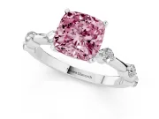 Fancy Pink Cushion Cut Diamond Solitaire Ring Set in White gold with Bezel Set Side Stones and Prong Setting