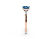 Fancy Blue Asscher Cut Diamond Solitaire Ring Set in Rose gold with Tapered Baguette Side Stones and Prong Setting