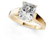 Radiant Cut Diamond Solitaire Engagement Ring Set in Yellow gold with Prong Setting and Tapered Band