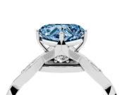 Fancy Blue Heart Cut Diamond Twist Band Solitaire Ring Set in Silver with Leaf Prong Setting and Accent Stones