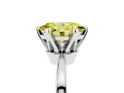 Fancy Yellow Oval Cut Diamond Solitaire Engagement Ring Set in White gold with Slim Tapered Solitaire Band