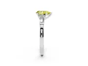 Fancy Yellow Pear Cut Diamond Solitaire Ring Set in Silver with Tapered Baguette Accents and Prong Setting