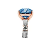 Fancy Blue Cushion Cut Diamond Solitaire Set in Rose gold with Side Baguettes and Channel Set Band