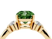 Fancy Green Three-Stone Cushion Cut Diamond Channel Set Ring Set in Yellow gold with Bar Prongs