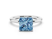 Fancy Blue Princess Cut Diamond Solitaire Ring Set in Silver with Thin Band and Prong Setting