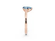 Fancy Blue Pear Cut Diamond Solitaire Ring Set in Rose gold with Cathedral Band and Prong Setting