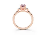 Fancy Pink Three-Stone Oval Cut Diamond Ring Set in Rose gold with Prong Setting and Plain Band