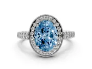 Fancy Blue Oval Cut Diamond Milgrain Halo Solitaire Ring Set in Silver with Bezel Set Side Stones and Pavé Band