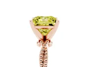 Fancy Yellow Princess Cut Diamond Solitaire Ring Set in Rose gold with Twisted Band and Bead Prong Setting