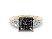 Fancy Black Three-Stone Princess Cut Diamond Ring Set in Yellow gold with Pear Side Stones and Prong Setting