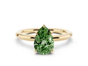 Fancy Green Pear Cut Diamond Solitaire Ring Set in Yellow gold with Thin Band and Prong Setting