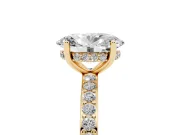 Oval Cut Diamond Pavé Band Ring Set in Yellow gold with Prong-Set Center Stone