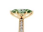 Fancy Green Marquise Cut Diamond Solitaire Ring Set in Yellow gold with Slim Pavé Band and Prong Setting