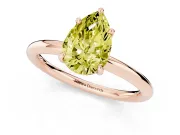 Fancy Yellow Pear Cut Diamond Solitaire Ring Set in Rose gold with Thin Band and Prong Setting