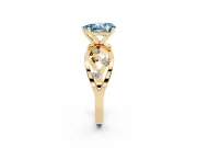 Fancy Blue Pear Cut Diamond Solitaire Ring Set in Yellow gold with Side Stones on Criss-Cross Band and Prong Setting