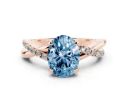 Fancy Blue Oval Cut Diamond Twist Band Solitaire Set in Rose gold with Pavé Accents and Prong Setting