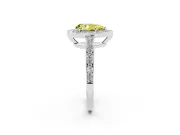 Fancy Yellow Pear Cut Diamond Halo Pavé Engagement Ring Set in Silver with Bezel Setting