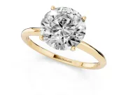 Round Cut Diamond Solitaire Engagement Ring Set in Yellow gold with Thin Band and Prong Setting