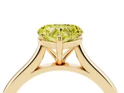 Fancy Yellow Heart Cut Diamond Solitaire Ring Set in Yellow gold with Cathedral Band and Prong Setting