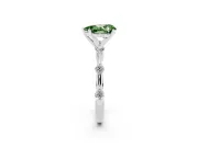 Fancy Green Pear Cut Diamond Solitaire Ring Set in White gold with Bezel Set Side Stones and Prong Setting
