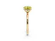 Fancy Yellow Round Cut Diamond Solitaire Engagement Ring Set in Yellow gold with Prong Setting and Polished Band