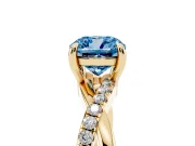 Fancy Blue Cushion Cut Diamond Twist Band Solitaire Set in Yellow gold with Pavé Accents and Prong Setting