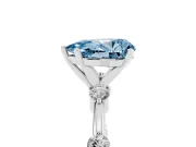 Fancy Blue Pear Cut Diamond Solitaire Ring Set in White gold with Bezel Set Side Stones and Prong Setting
