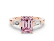 Fancy Pink Emerald Cut Diamond Solitaire Ring Set in Rose gold with Tapered Baguette Accents and Prong Setting