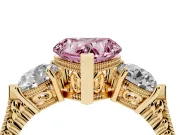 Fancy Pink Heart Cut Diamond Three-Stone Ring Set in Yellow gold with Milgrain Band