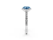 Fancy Blue Round Cut Diamond Halo Engagement Ring Set in Silver with Pavé Band and Prong Setting