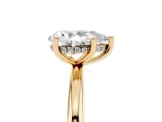 Pear Cut Diamond Solitaire Engagement Ring Set in Yellow gold with Prong Setting and Polished Band