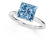 Fancy Blue Princess Cut Diamond Solitaire Ring Set in White gold with Thin Band and Prong Setting