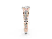 Oval Graduated Side Stone Engagement Ring Setting | Shared Prong Rails | Rose Gold