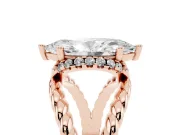 Marquise Cut Diamond Halo Ring Set in Rose gold with Twisted Band and Prong Setting