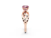 Fancy Pink Princess Cut Diamond Solitaire Ring Set in Rose gold with Side Stones on Criss-Cross Band and Prong Setting